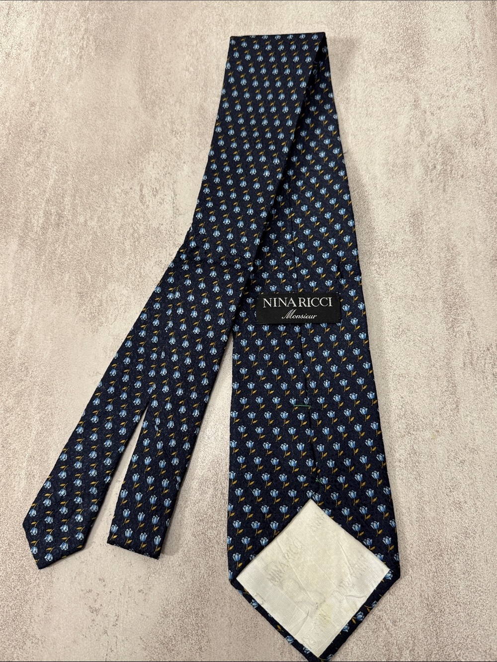Nina Ricci Dark Blue Silk Tie with Light Blue Floral Motif